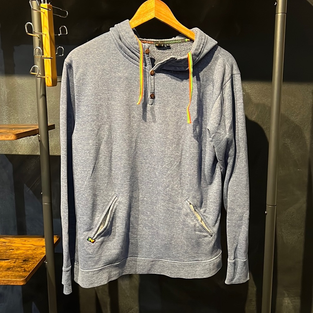 Blue sweater with front pockets & hood. Creative CollaborationSz:Medium